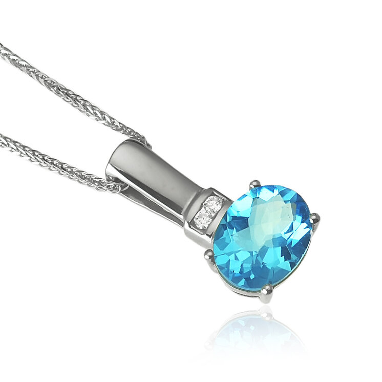 Zlatý prívesok s diamantmi a topásom