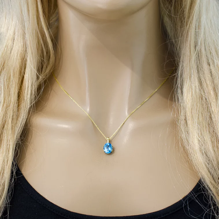 Zlatý prívesok s diamantmi a topásom Zlatý prívesok s diamantmi a topásom