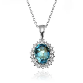 Zlatý prívesok s london blue topásom a diamantmi Zlatý prívesok s london blue topásom a diamantmi