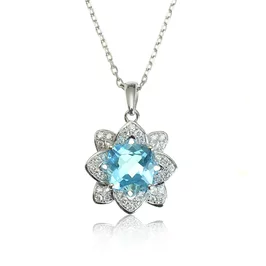 Zlatý prívesok s topásom a diamantmi Sky flower Zlatý prívesok s topásom a diamantmi Sky flower